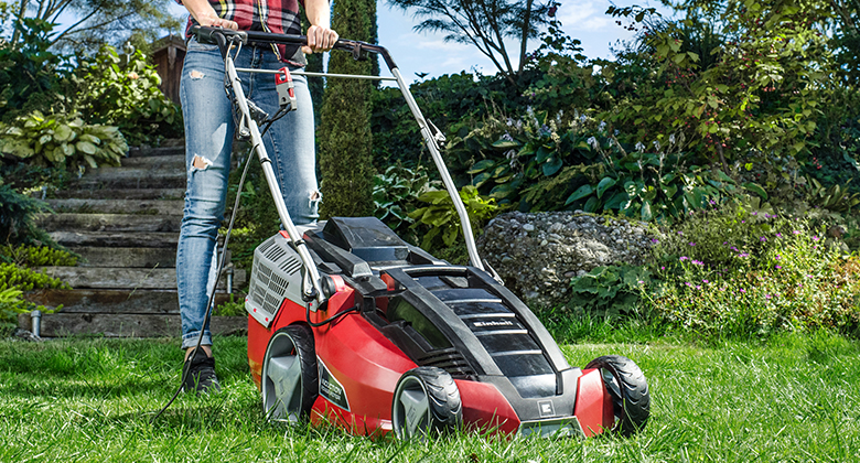 Lawn mower in the garden